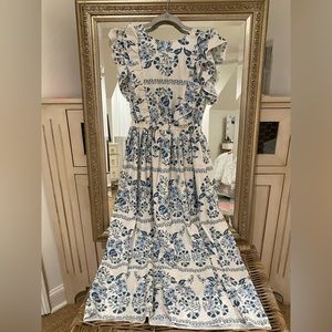 white and blue long dress with an open back and high neck from pink ripple